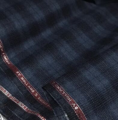 12% de laine TR Check Suiting Fabric mélange élégance classique avec raffinement moderne.