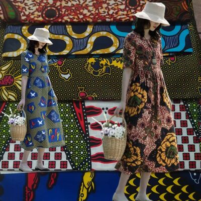 Tissu africain en cire 100% coton avec une grande résistance aux plis et des couleurs vives pour robes Ankara et Kitenge